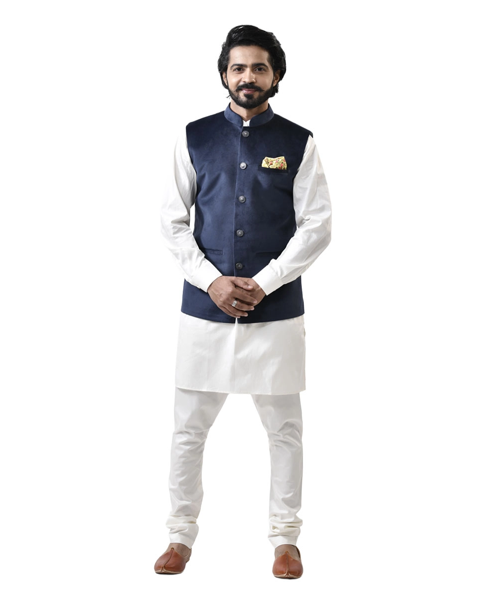 Shop-Blue-Velvet-Bundi-with-White-Kurta-Pajama Navy Blue Velvet Bundi with White Kurta and White Pajama – Combo Set - Image 1